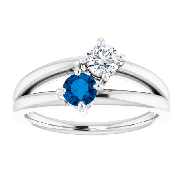 Bague Sertie D'un Diamant et D'un Saphir Bleu En Or Blanc