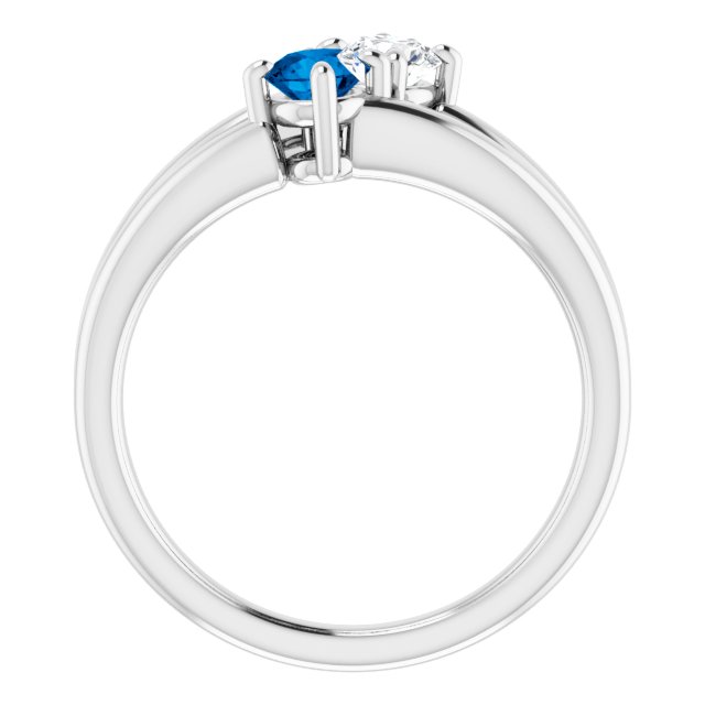 Bague Sertie D'un Diamant et D'un Saphir Bleu En Or Blanc