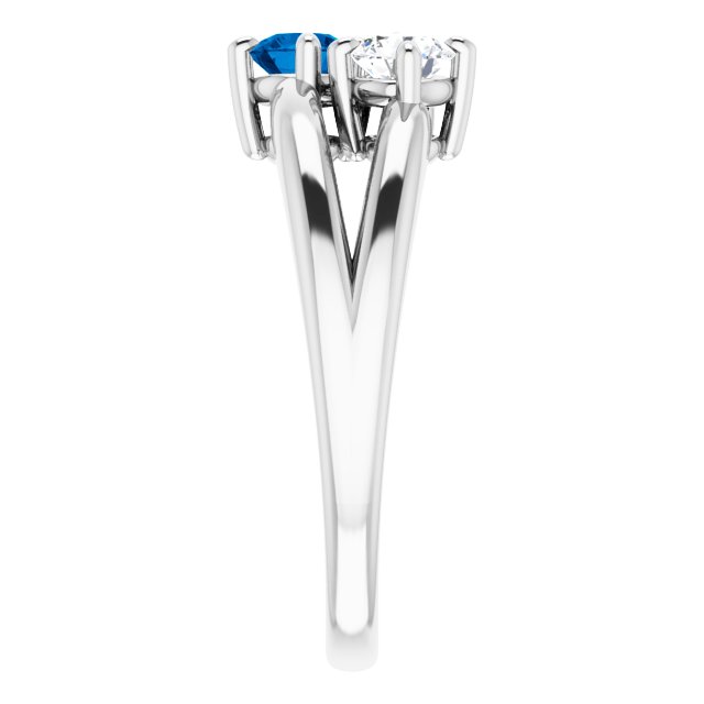 Bague Sertie D'un Diamant et D'un Saphir Bleu En Or Blanc