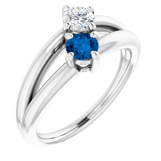 Bague Sertie D'un Diamant et D'un Saphir Bleu En Or Blanc