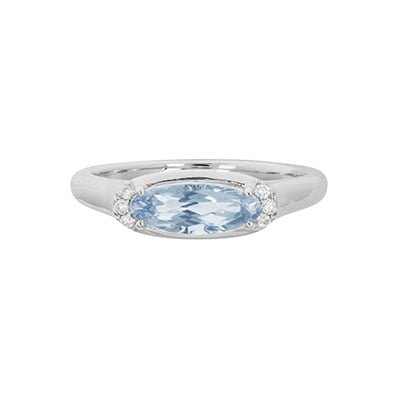 Bague dame or blanc 14 Karats sertie d'une Aigue Marine de forme ovale et de 0,05 carat de diamants
